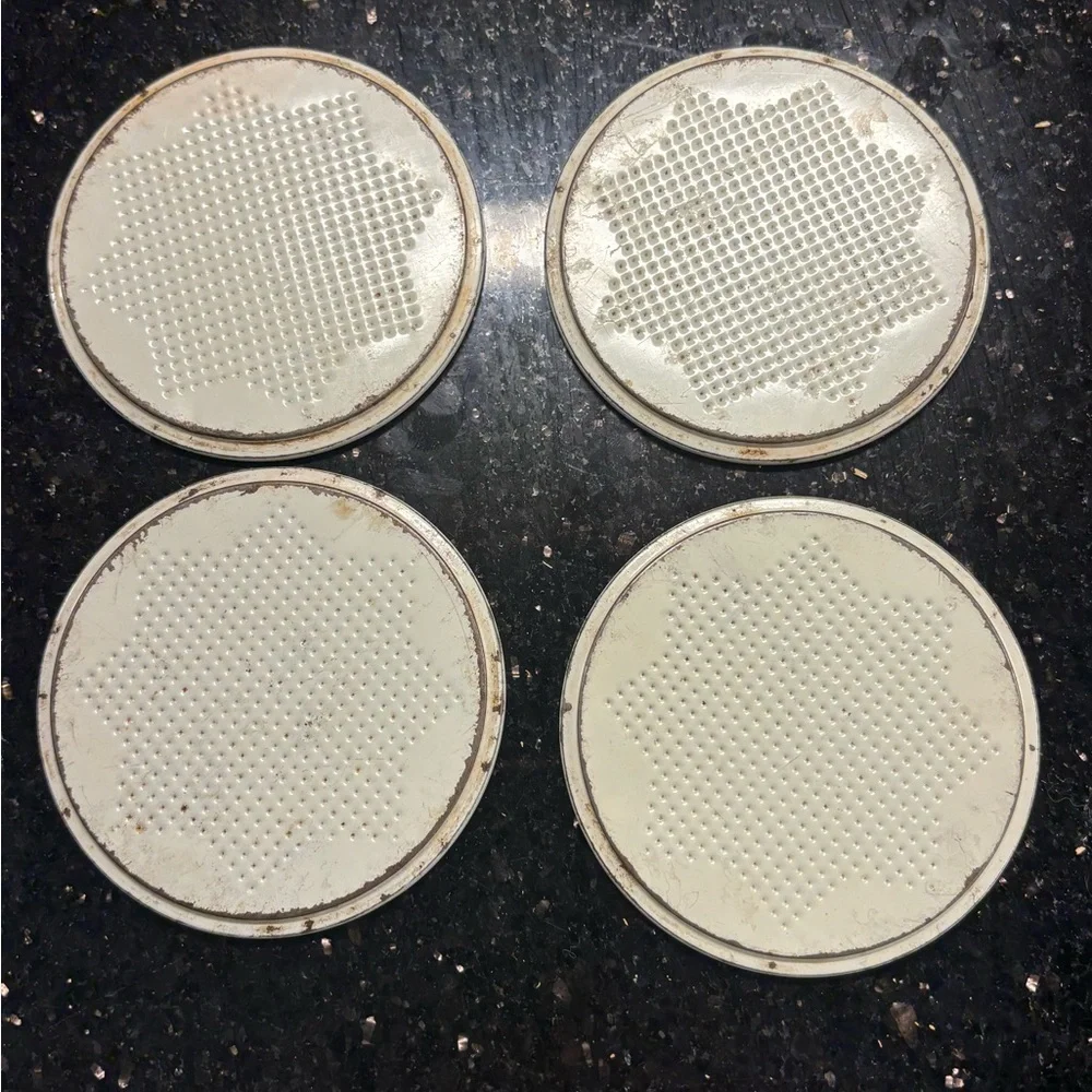 4 vintage metal floral textured coasters circle round